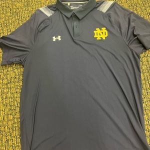 Large Notre Dame UA polo. Navy blue with gold monogram